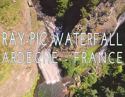 Ray-Pic Waterfall, flight in the heart of the regional natural park of Monts d'Ardèche. Nature video, environment, exceptional site in France